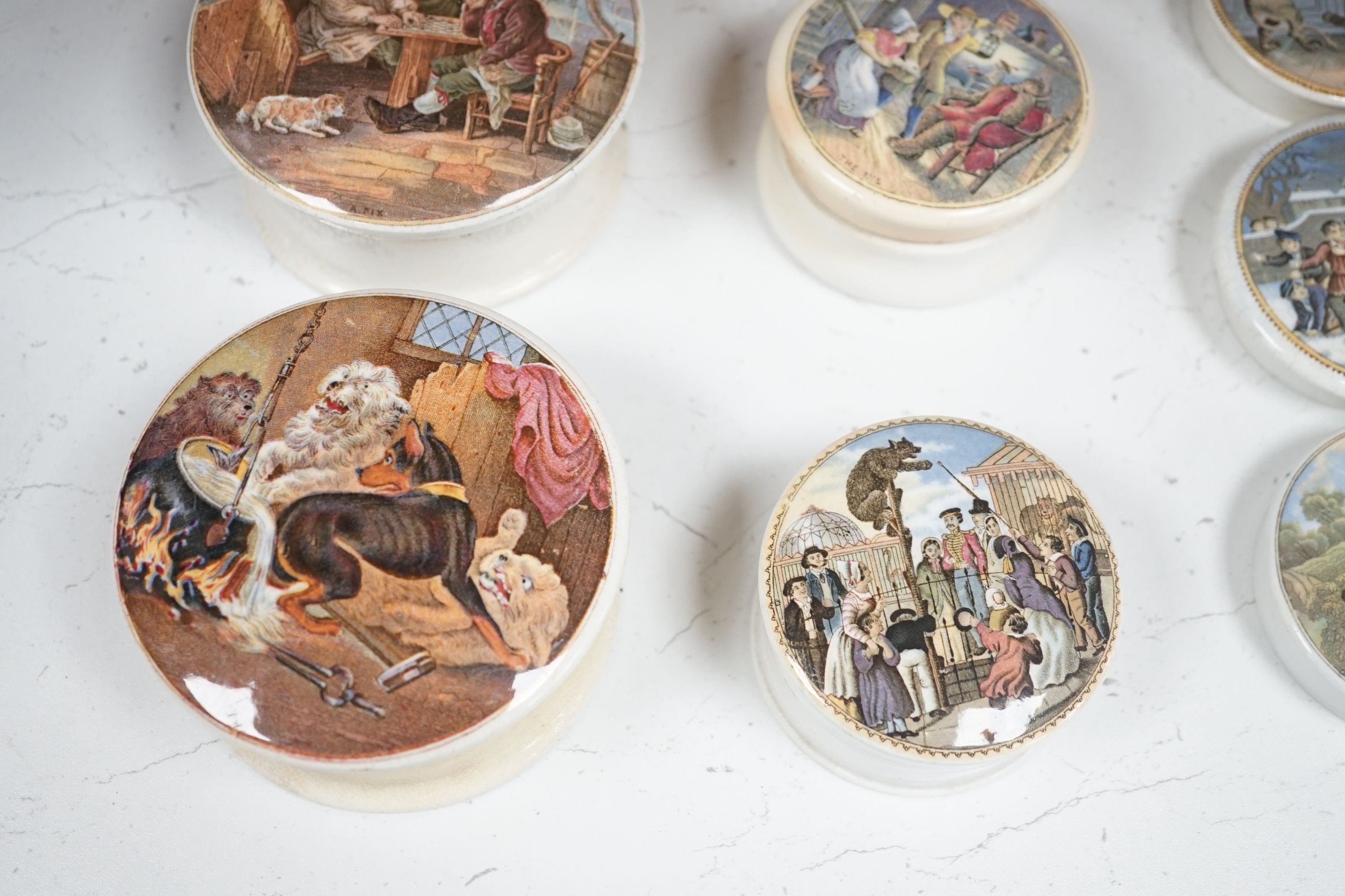 Ten Victorian pot lids including six bear's grease, largest 10.5 cms diameter.